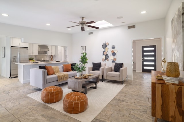 living room featuring ceiling fan