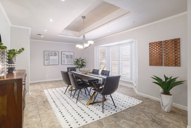 dining room with ornamental molding and an inviting chandelier