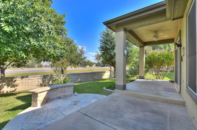 view of patio / terrace featuring ceiling fan