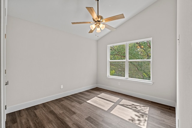 empty room featuring lofted ceiling, ceiling fan, and wood-type flooring