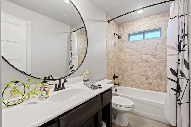 full bathroom featuring vanity, toilet, and shower / bathtub combination with curtain