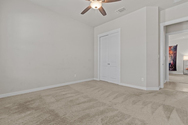 unfurnished bedroom with carpet flooring and ceiling fan