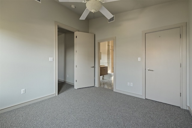 unfurnished bedroom with ceiling fan and carpet