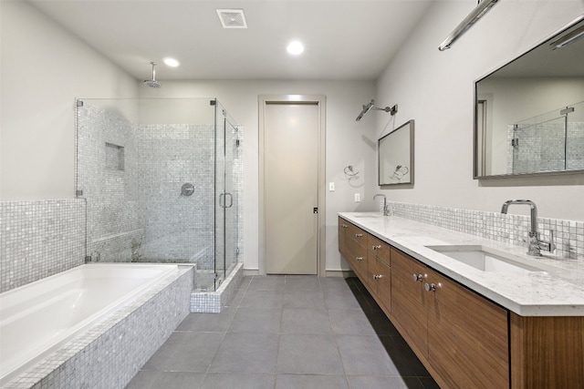 bathroom with vanity, tile patterned floors, and independent shower and bath