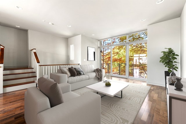 living room featuring a wall of windows and dark wood-type flooring