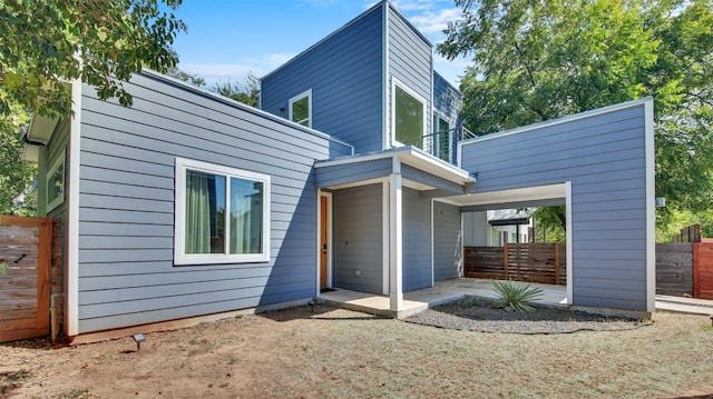 510 Blackson Ave Unit 2, Austin, TX 78752 - rear view of house with a patio