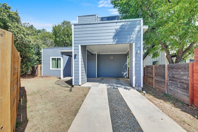 garage with fence