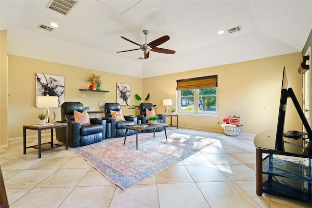 living room with ceiling fan and light tile patterned floors