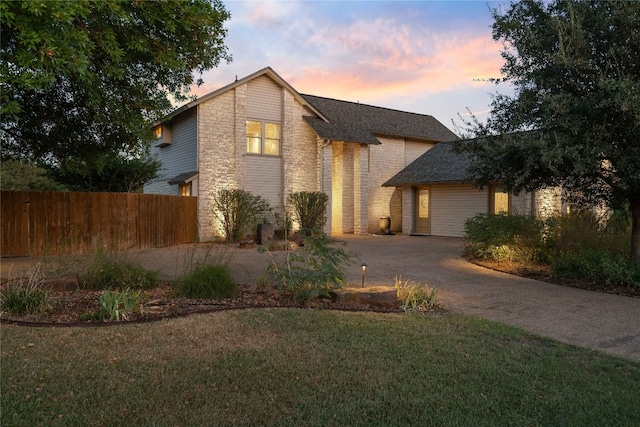 front of property featuring a lawn