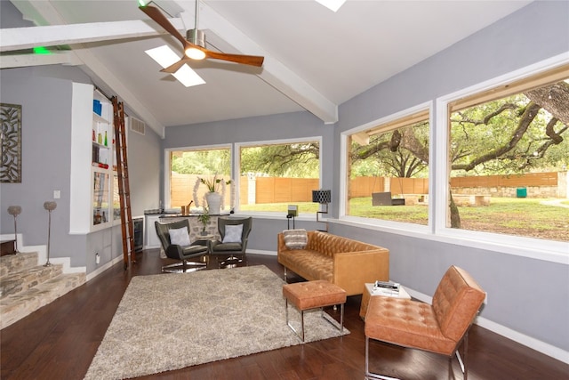 sunroom / solarium with lofted ceiling with beams and ceiling fan