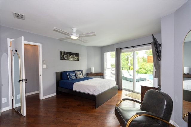 bedroom with access to outside, dark hardwood / wood-style flooring, and ceiling fan