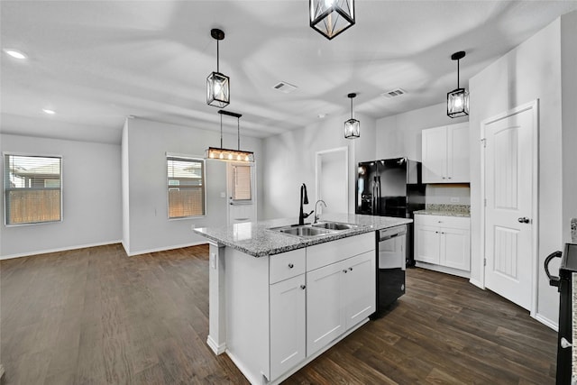 kitchen with black appliances, decorative light fixtures, sink, and white cabinetry