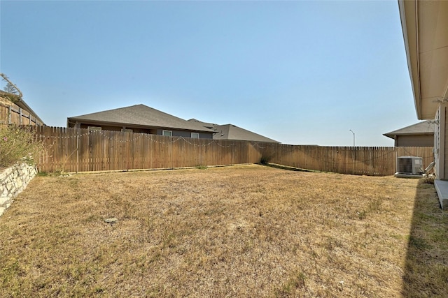 view of yard featuring central AC unit