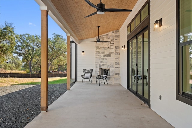 view of patio with ceiling fan and french doors