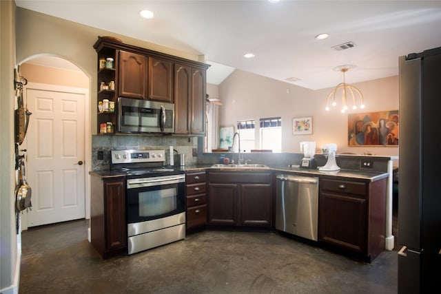 kitchen with appliances with stainless steel finishes, decorative light fixtures, dark brown cabinetry, a notable chandelier, and sink