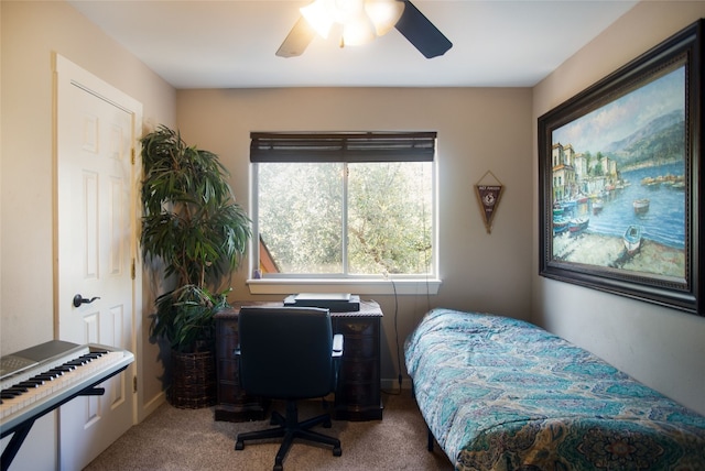 bedroom featuring ceiling fan and carpet floors