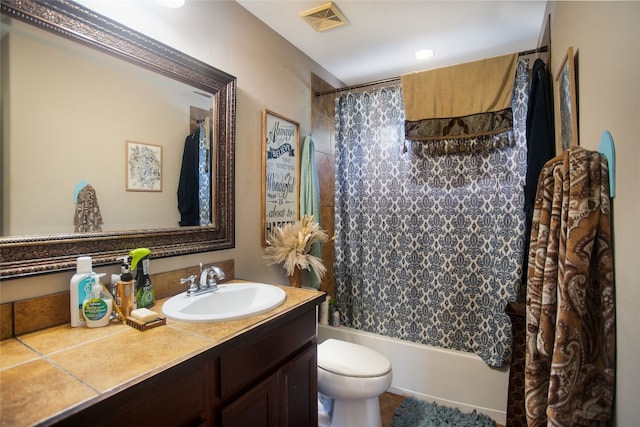 full bathroom with tile patterned flooring, vanity, toilet, and shower / tub combo