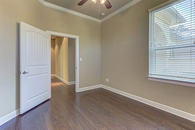 unfurnished room featuring dark hardwood / wood-style floors, ceiling fan, and ornamental molding