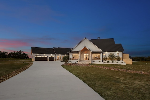 modern farmhouse with a yard