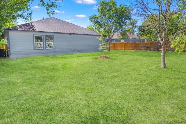 view of yard featuring central AC