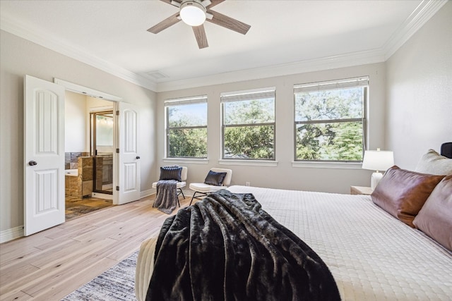 bedroom with crown molding, ensuite bathroom, light wood-type flooring, and ceiling fan