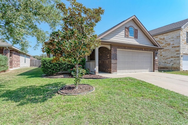 view of front facade with a front lawn and a garage