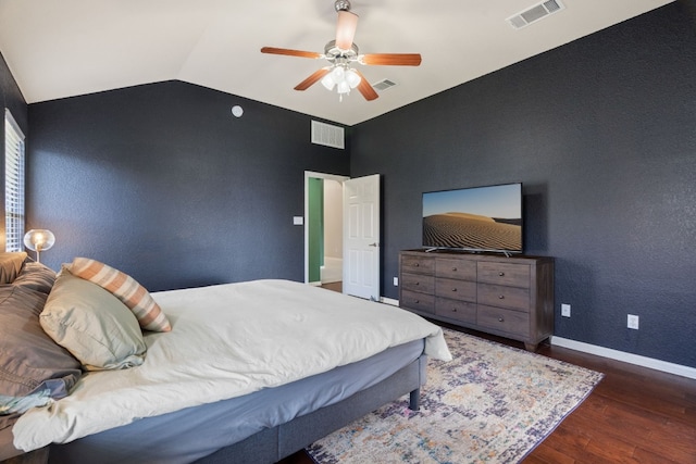 bedroom with dark hardwood / wood-style floors, ceiling fan, and lofted ceiling