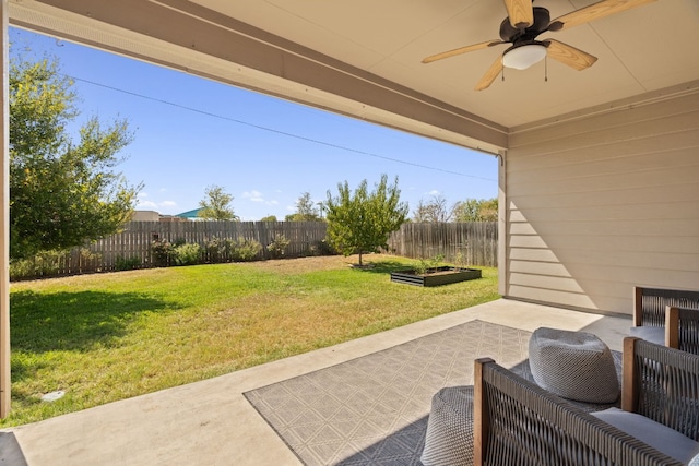 view of patio with ceiling fan