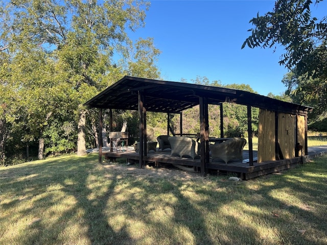 view of yard with a gazebo and a wooden deck