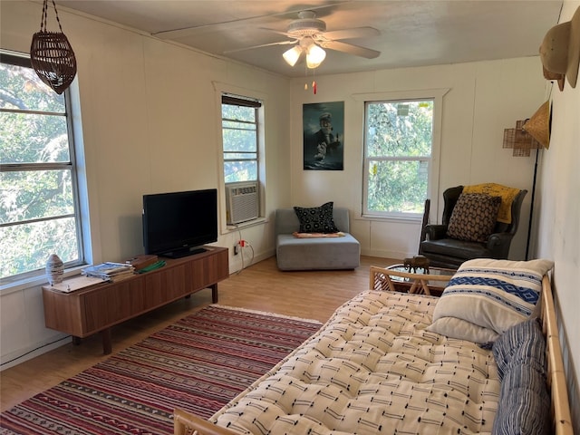 living room featuring a healthy amount of sunlight and wood-type flooring