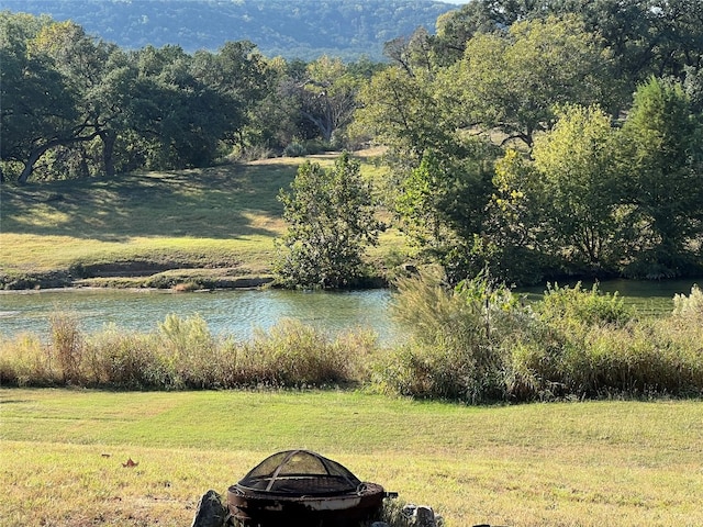 property view of mountains featuring a water view