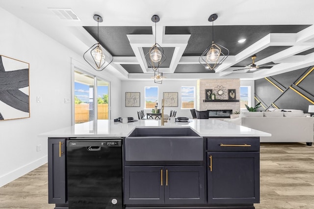 kitchen featuring light hardwood / wood-style floors, pendant lighting, coffered ceiling, dishwasher, and a fireplace