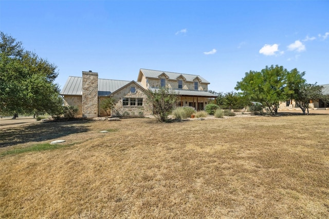 view of front facade with a front lawn