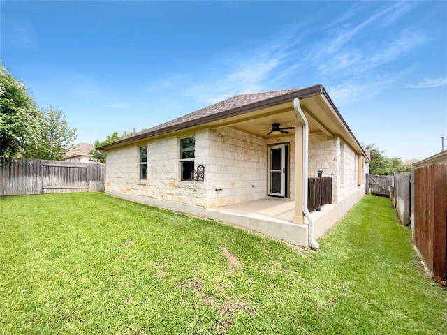305 Rock Mill Loop, Georgetown, TX 78626 - back of house featuring a ceiling fan