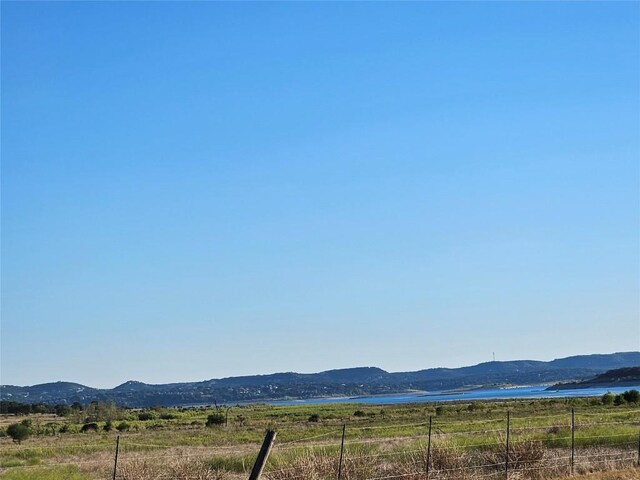 property view of mountains with a rural view