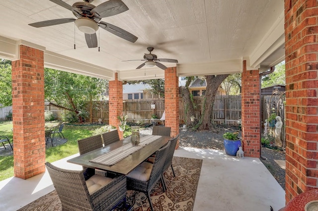 view of patio featuring ceiling fan