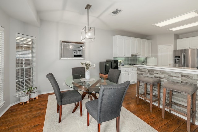 dining room featuring dark hardwood / wood-style floors