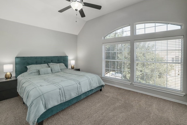 carpeted bedroom featuring ceiling fan and lofted ceiling