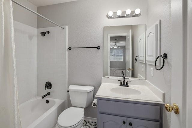 full bathroom featuring vanity, ceiling fan, toilet, and shower / bathtub combination with curtain