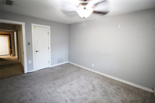 unfurnished room with carpet and ceiling fan