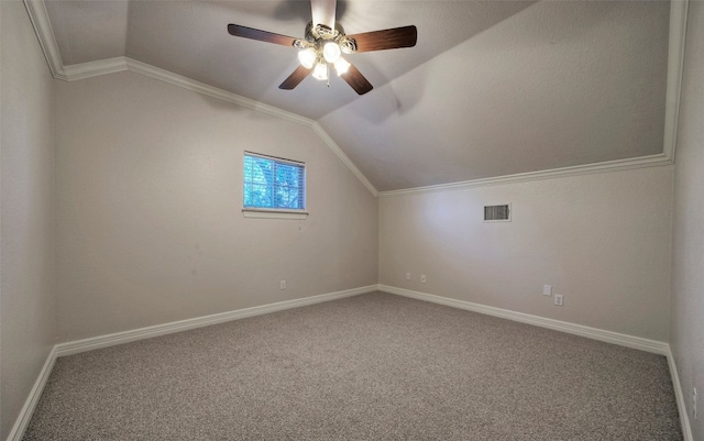 bonus room with ceiling fan, vaulted ceiling, carpet, and a textured ceiling