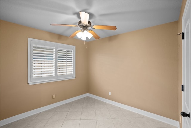 spare room featuring ceiling fan