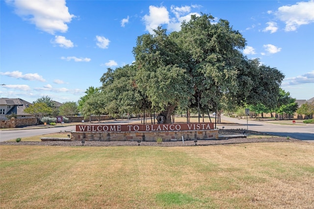 surrounding community featuring a yard