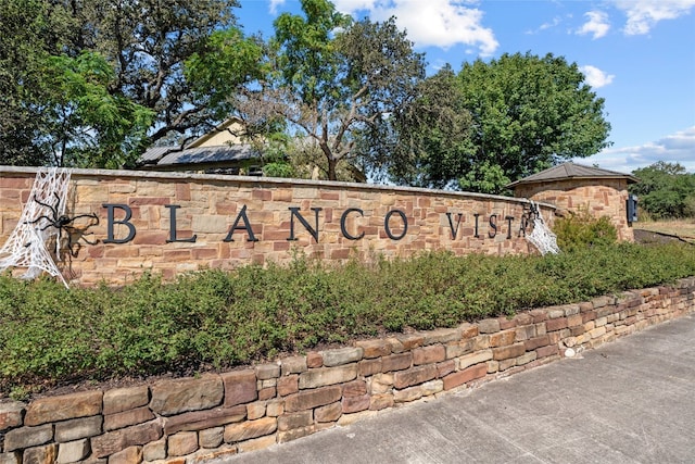 view of community sign