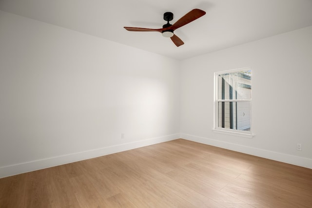 unfurnished room featuring ceiling fan and light hardwood / wood-style flooring