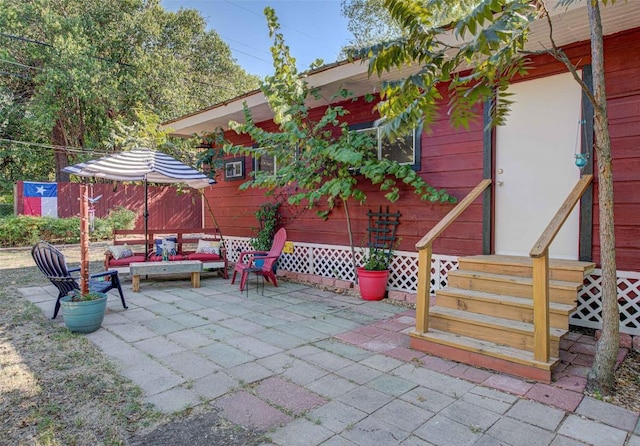 110 W Saint Johns Ave, Austin, TX 78752 - view of patio / terrace featuring an outdoor hangout area and entry steps