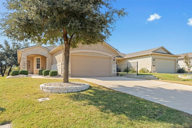 view of front of home featuring a garage and a front lawn