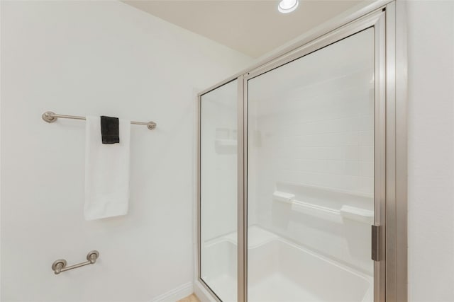 bathroom with an enclosed shower