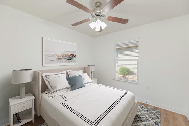 bedroom featuring ceiling fan and wood-type flooring