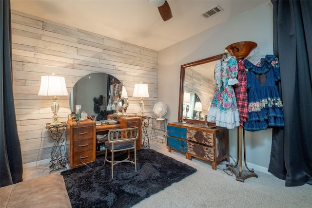 12614 Crystal Creek Dr, Buda, TX 78610 - office area featuring wooden walls, ceiling fan, and carpet